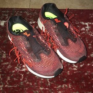 Nike orange running shoes